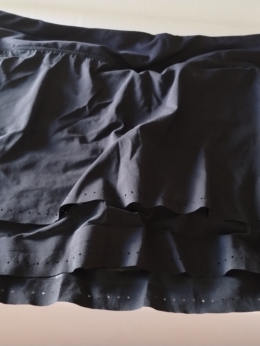 Athleta Black Mini Skirt/Skort with Laser-Cut Hem
